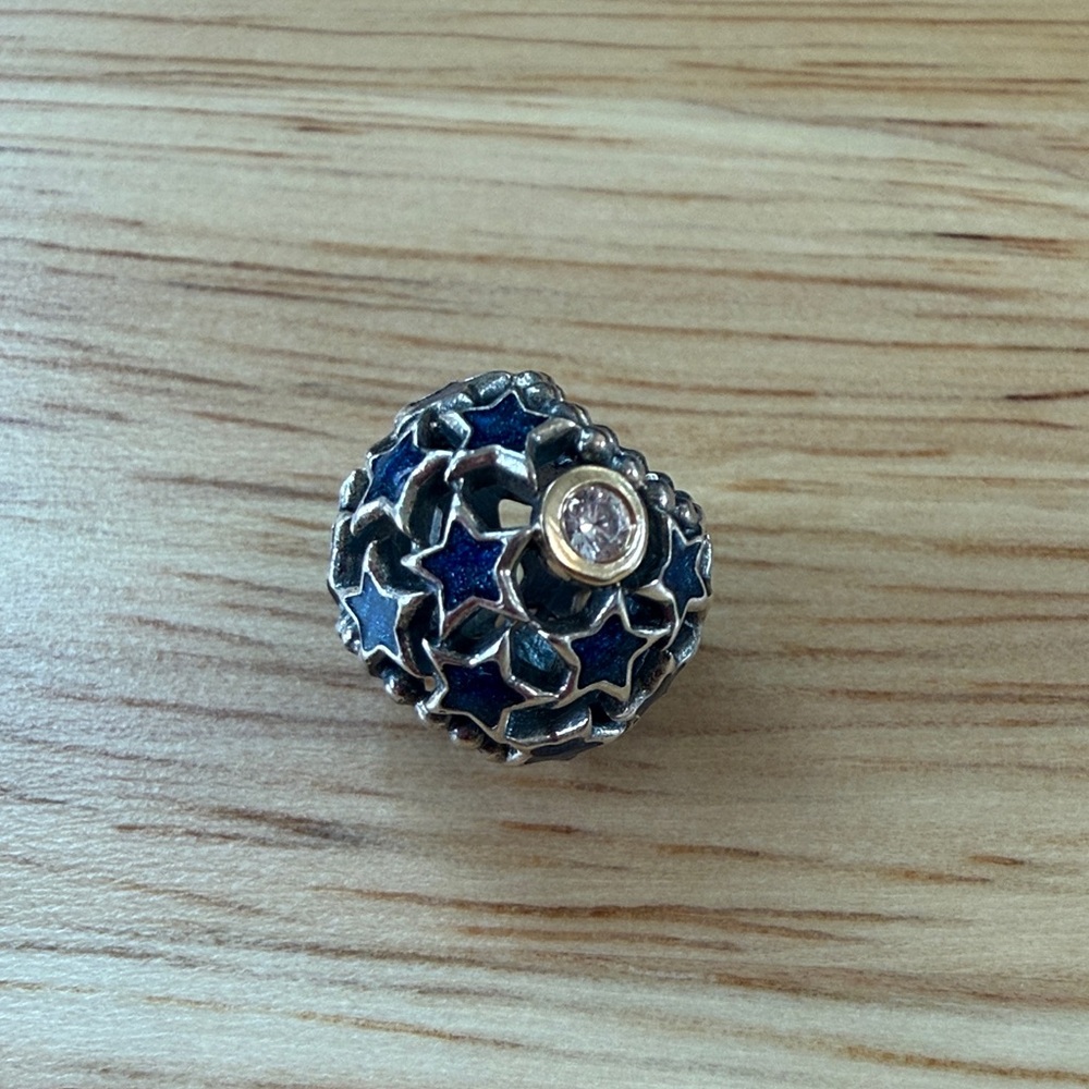 Retired Pandora Night Sky Charm with 14k gold, sterling silver, CZ, and enamel.